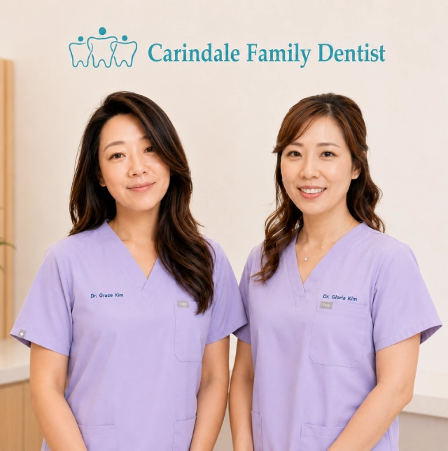 Dr Grace Eun Ah and Dr Gloria Kim standing together in the dental clinic Dr Grace Eun Ah and Dr Gloria Kim standing together in the dental clinic